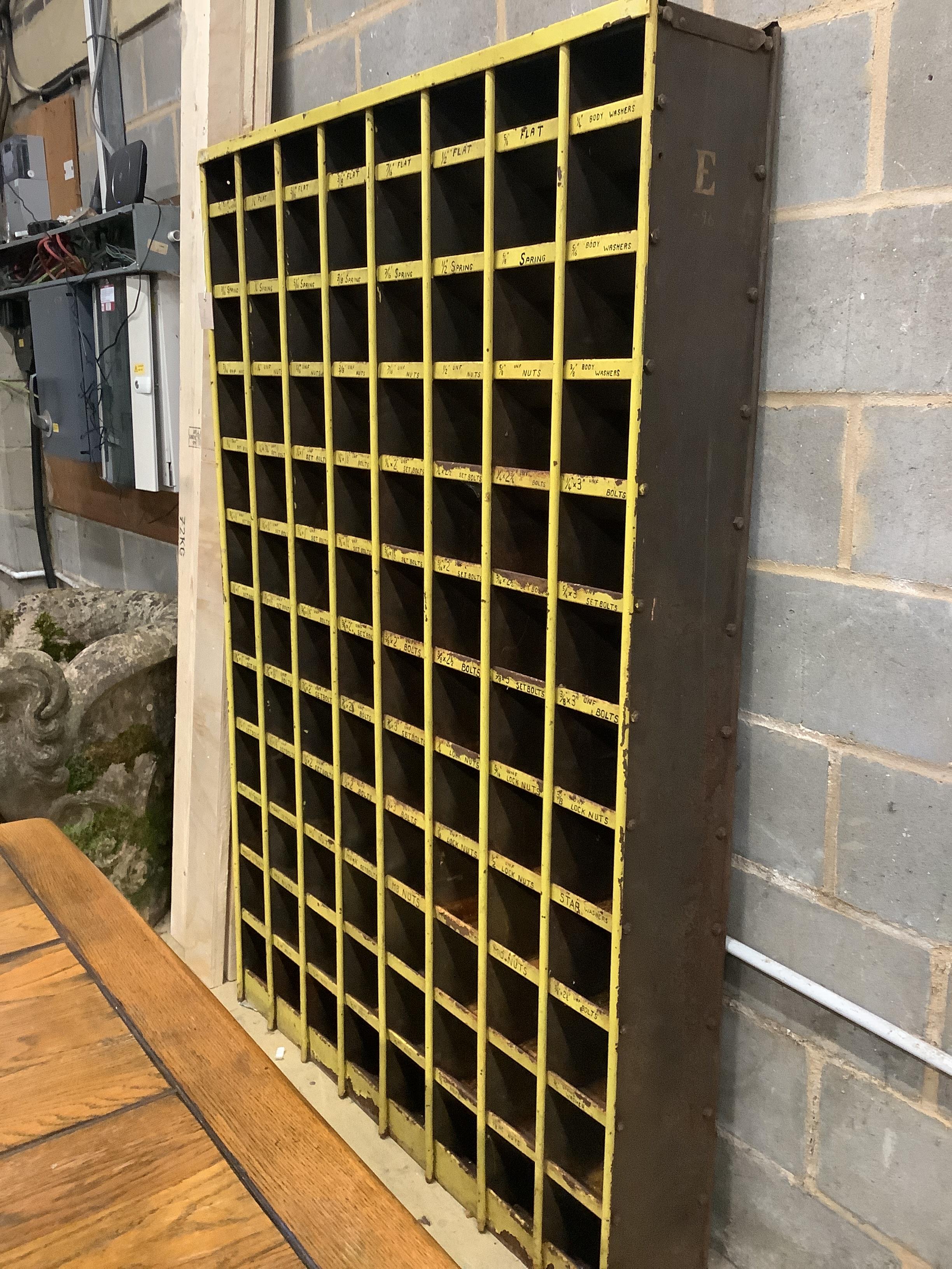A vintage industrial painted metal pigeonhole unit, width 123cm, depth 23cm, height 184cm